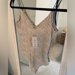 New with Tags body suit